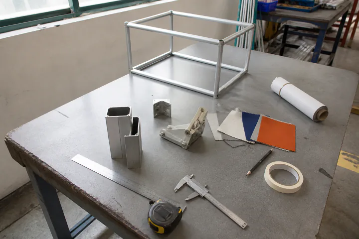 Outdoor display materials and frame samples arranged for specification
